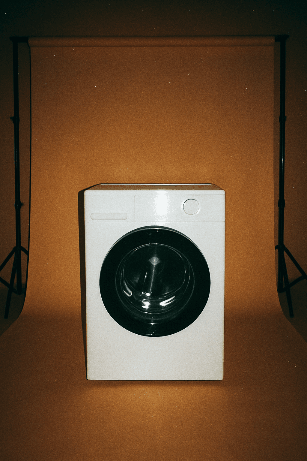 Single commercial front-load washing machine under studio lighting, highlighting durable design ideal for laundromat owners considering washer and dryer manufacturers.