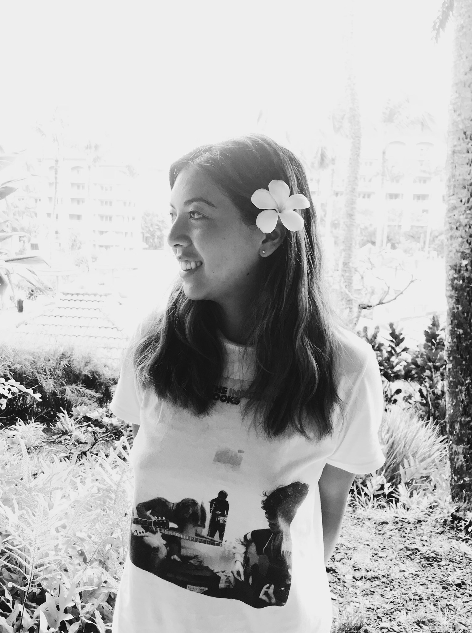 a blurry photo of a person standing in front of a wall