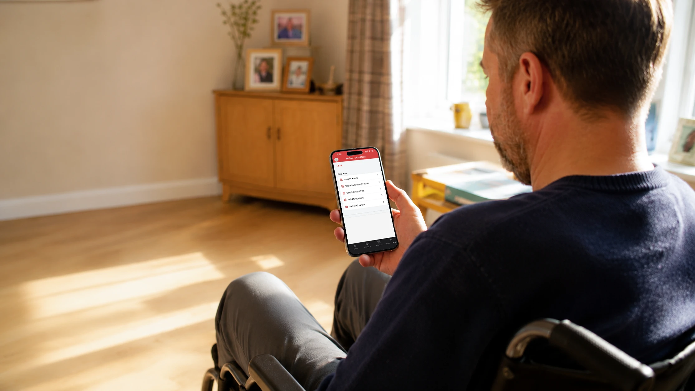 Care at home patient using the Karivo app on his smartphone.