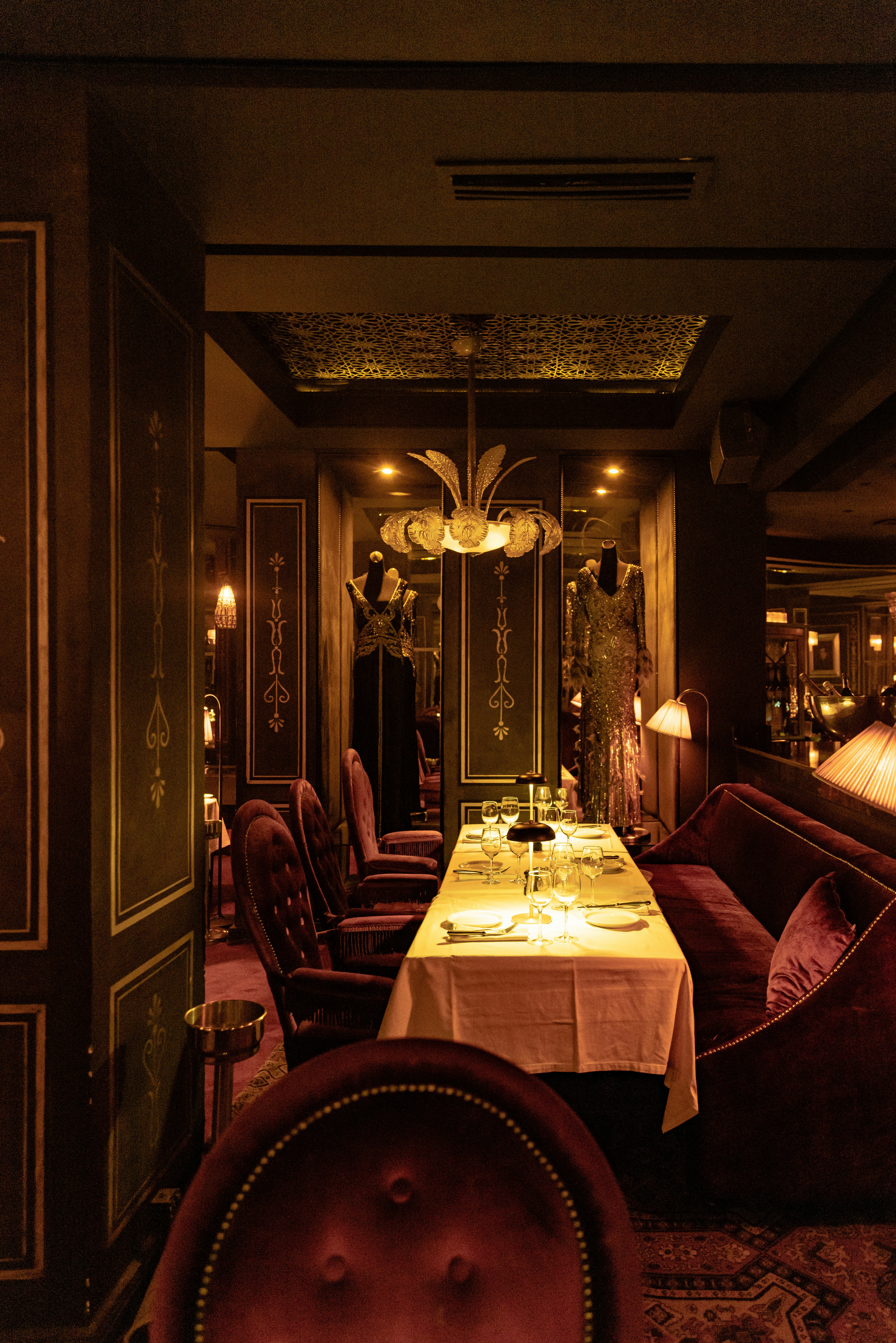 a dining room with a table and chairs