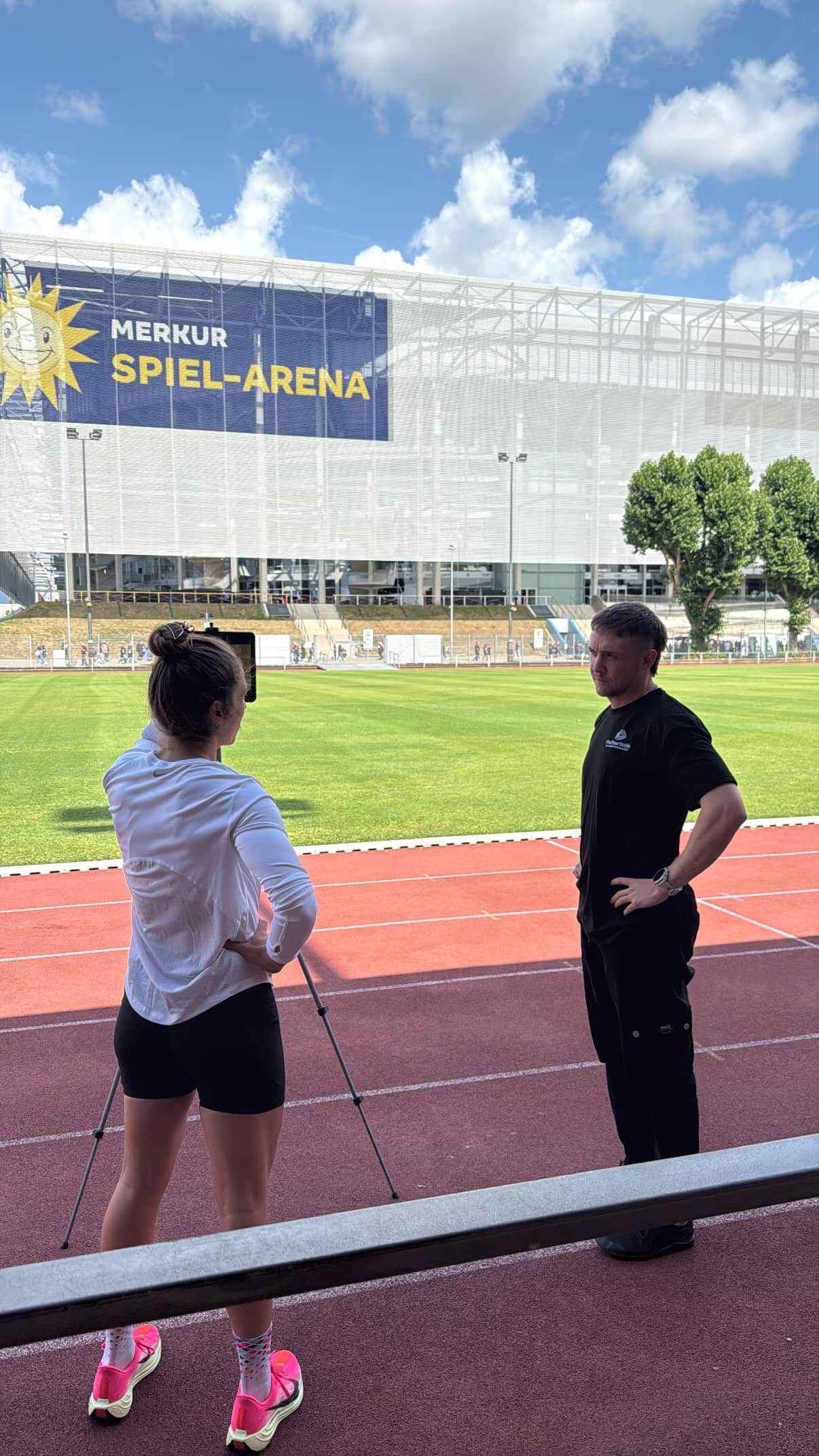 Rachel Stone, personal trainer working out sweaty with a barbell