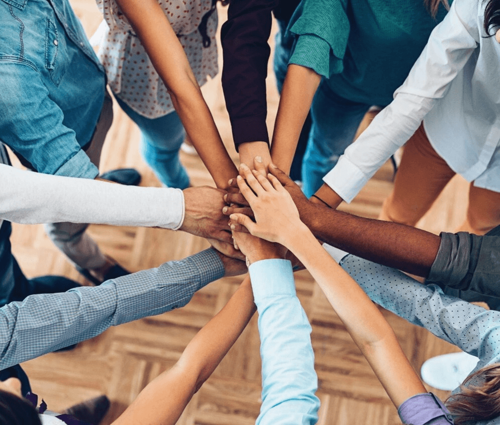 People lifting hands on the floor.