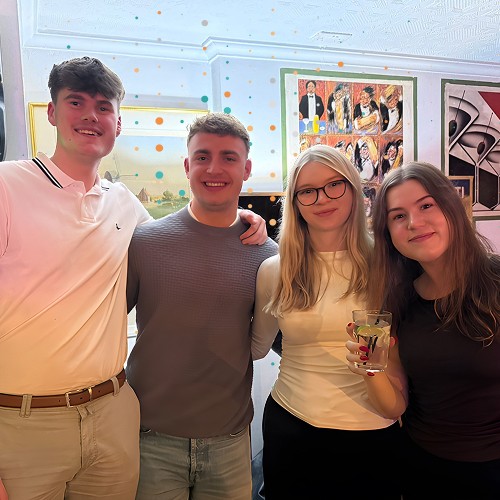 Academy employees working together