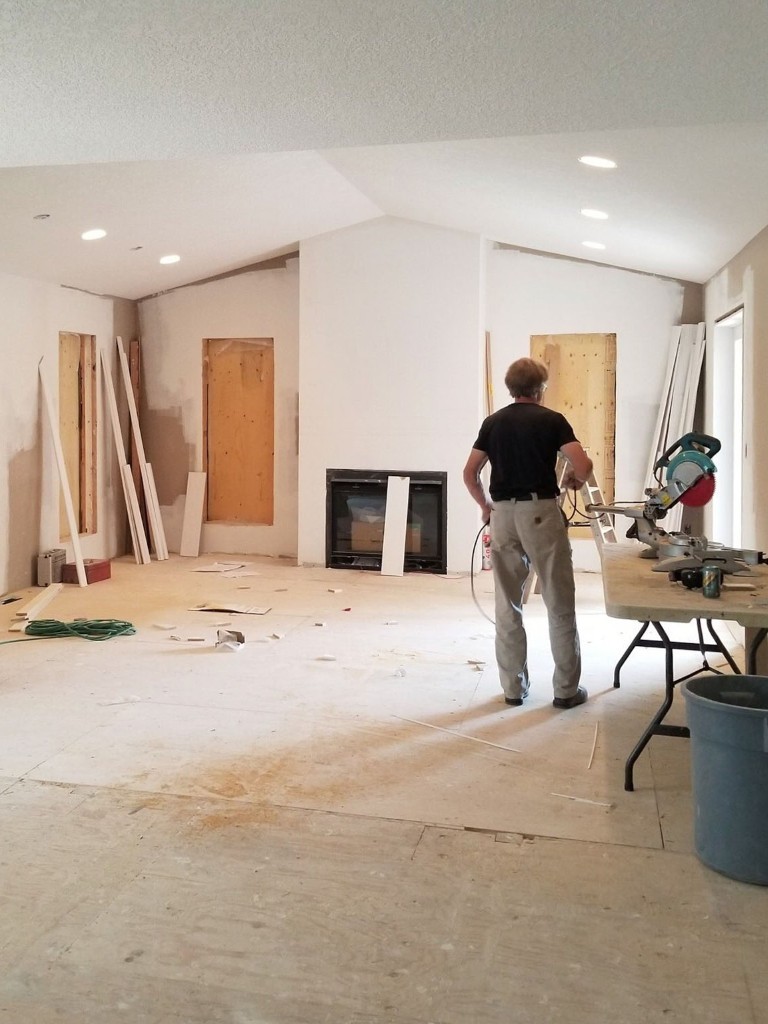 Image of KHD Homes construction team working on home renovations with design-build layout and interior design elements.