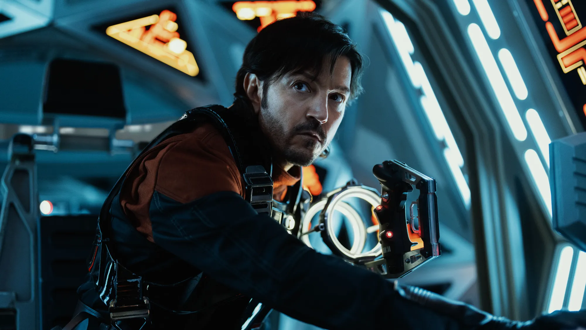 Diego Luna as Cassian Andor inside a spacecraft, looking intently to the side in the TV show'Andor'.
