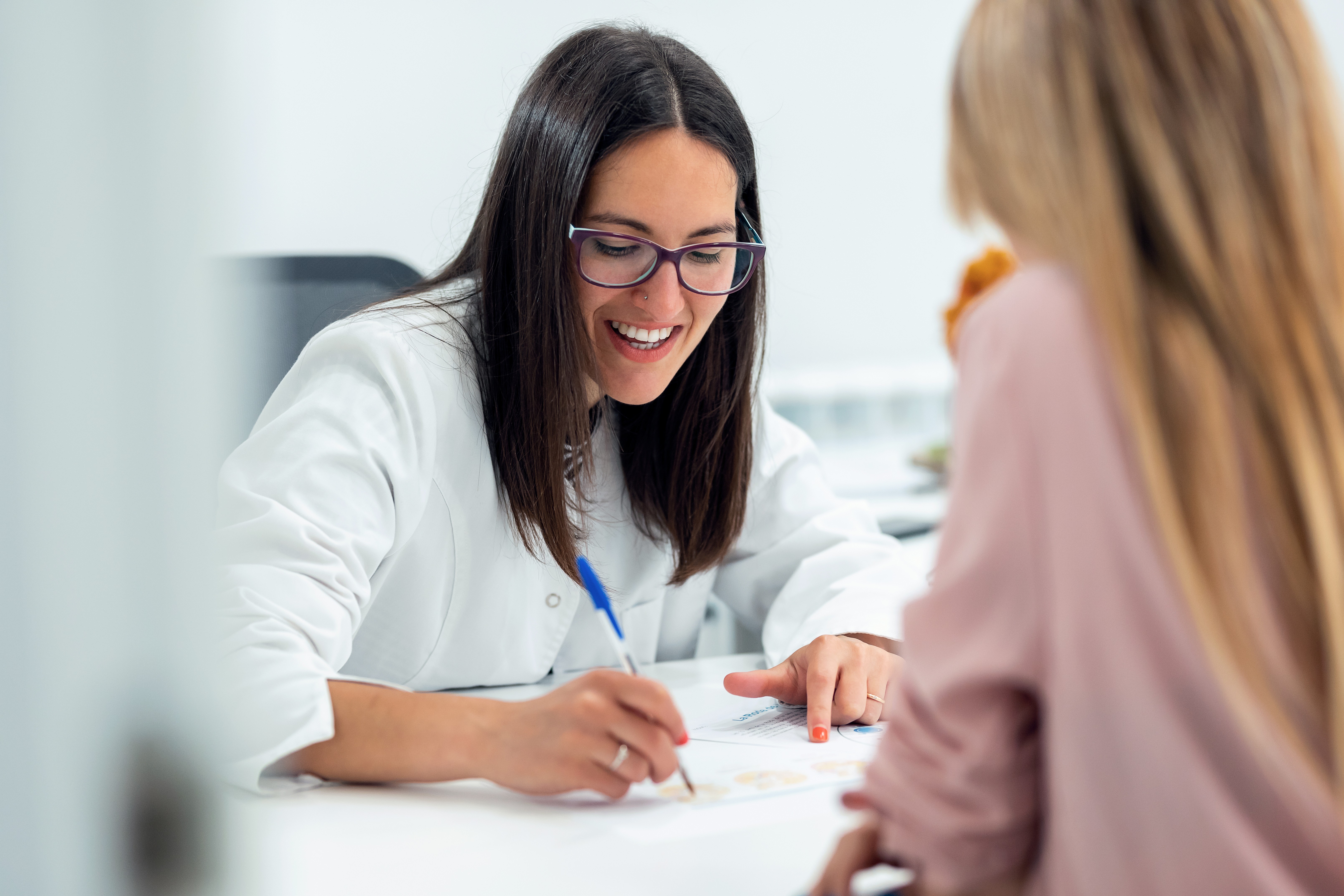 A+P House Calls provider conducting a personalized weight loss evaluation with a patient at home on Long Island, NY