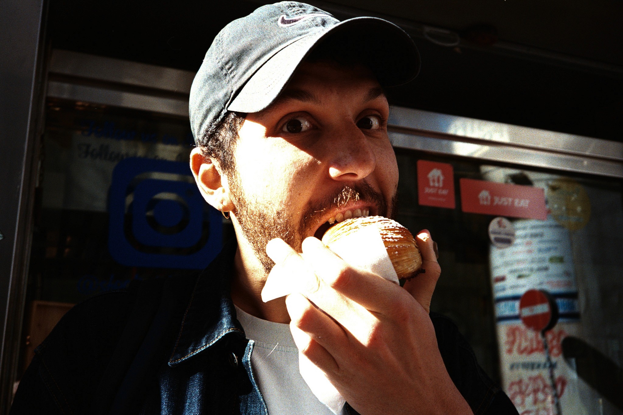 a blurry photo of a person standing in front of a wall