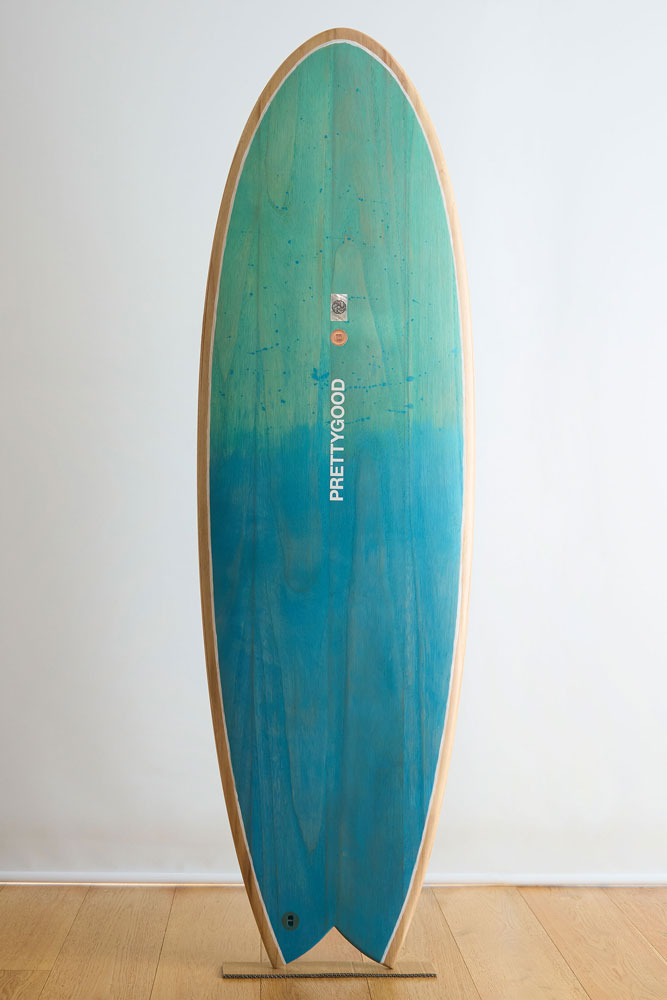 Wooden surfboard with blue stain