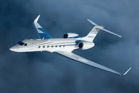 white airliner on gray pavement