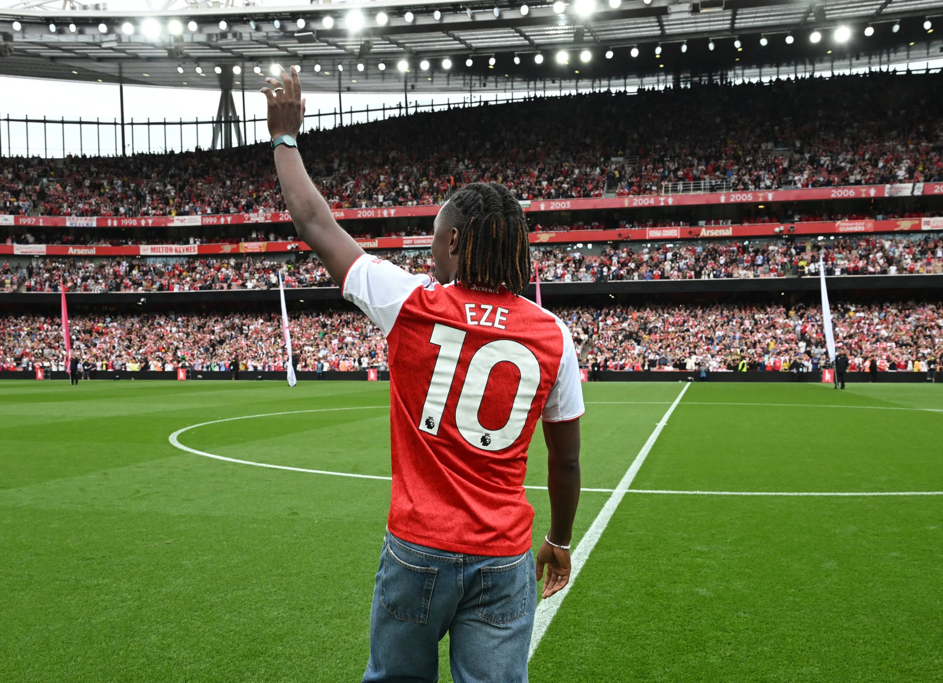 kids lying on a glass land and smiling