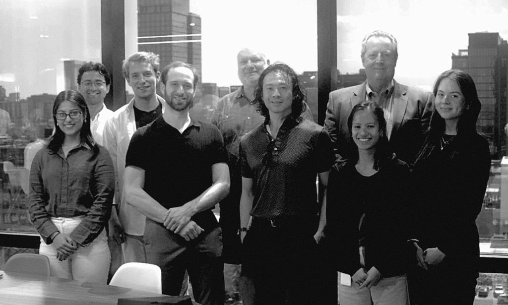 The Stratum Biosciences team standing together in the office.