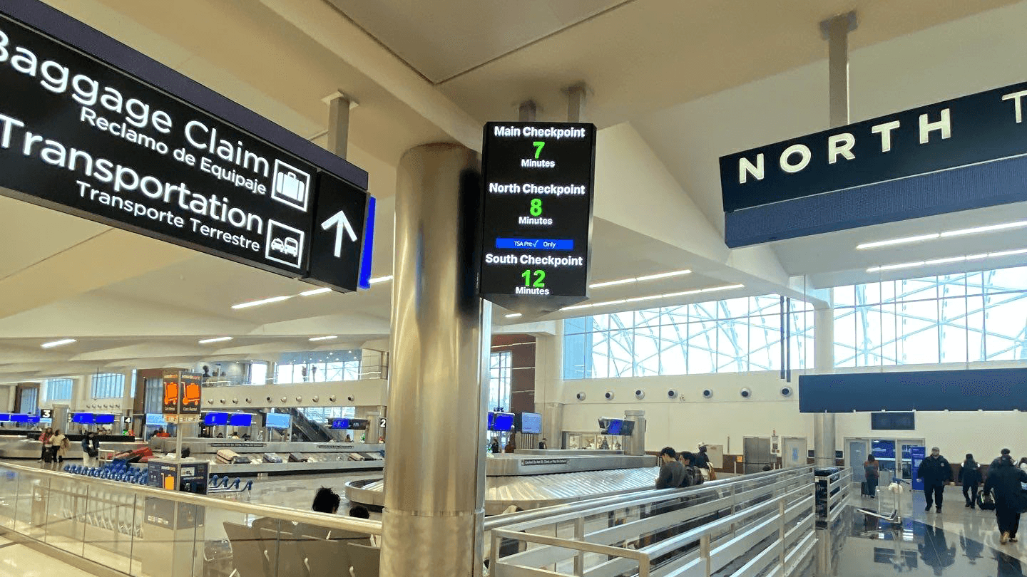 A photo of security checkpoint screens at ATL