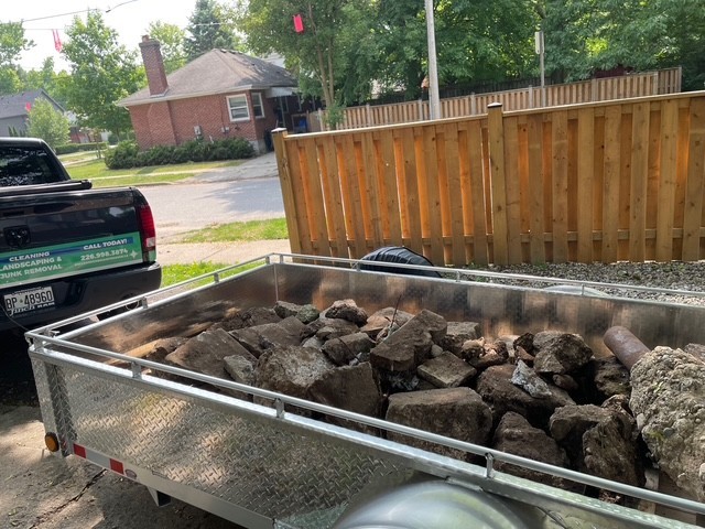 a garage filled with lots of clutter and tools