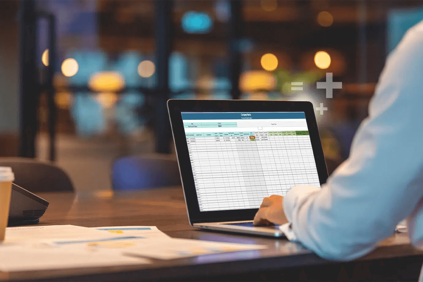 Laptop showing business spreadsheet - 7 Ways to Apply Accounting Format in Excel in 10 Minutes