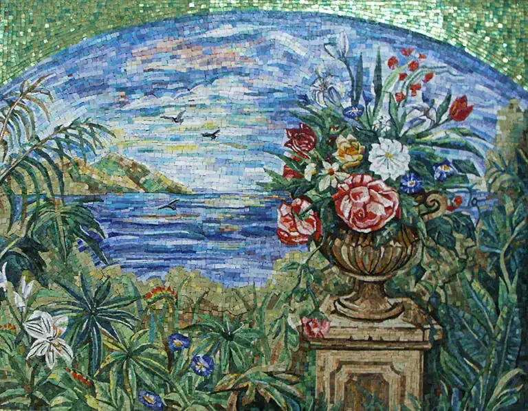Vibrant mosaic art featuring glass tiles with colorful flowers and a scenic water backdrop.