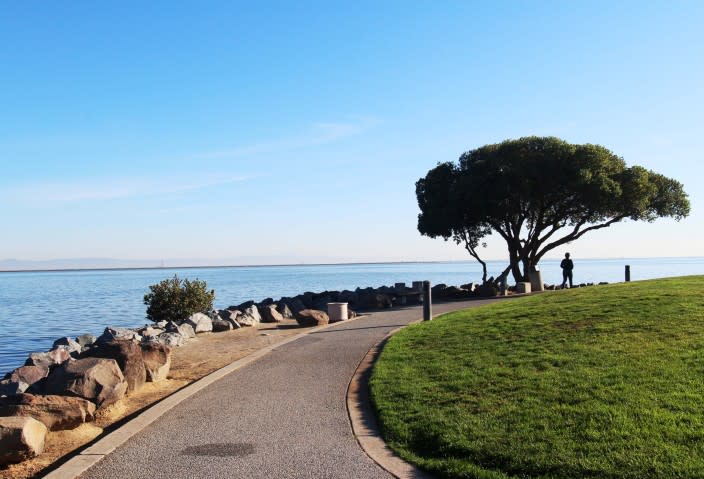 walking along a waterfront path in Burlingame