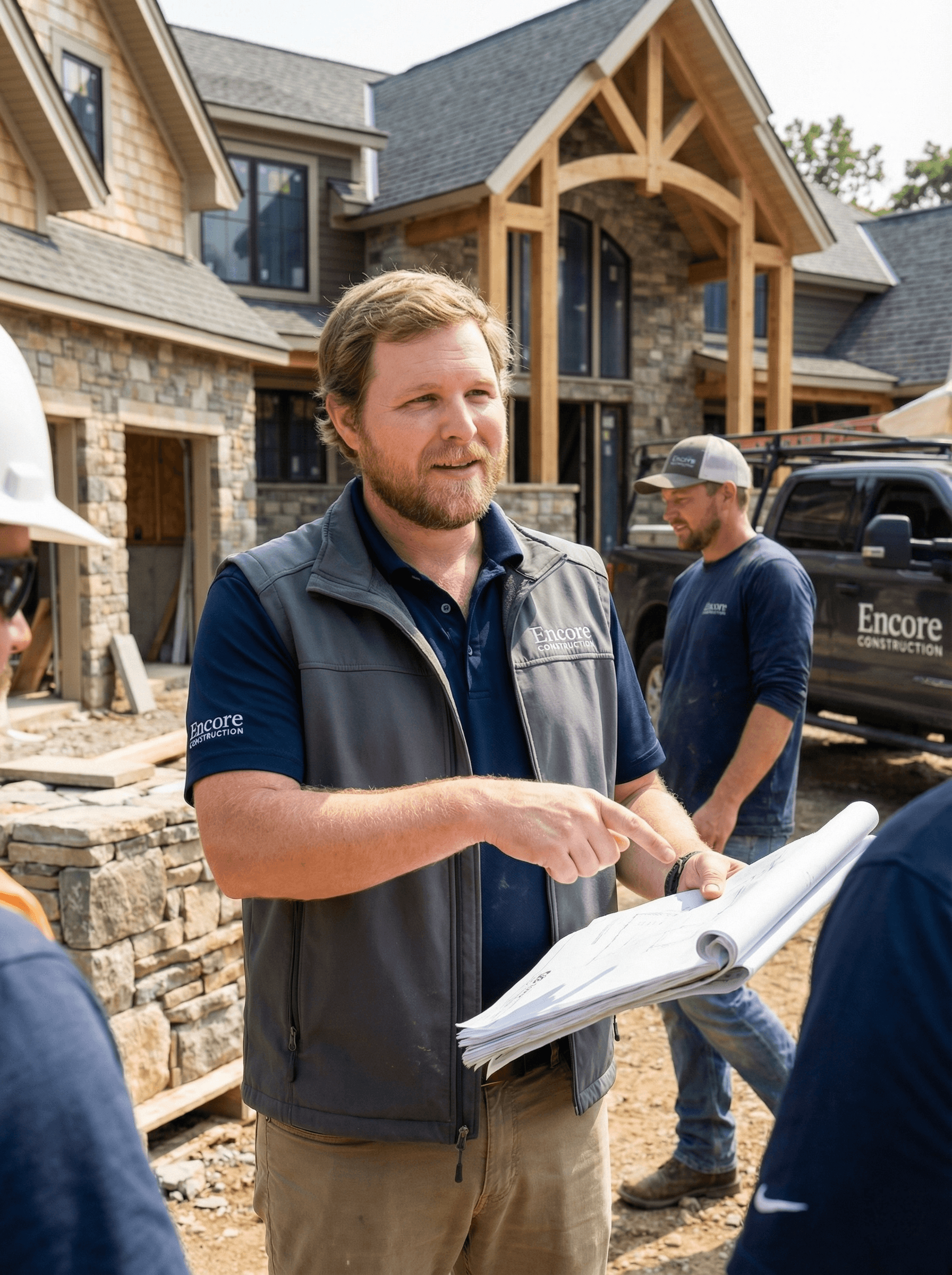 a man in a suit standing with his arms crossed