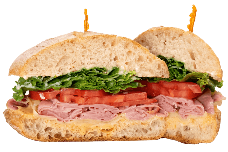 Traditional sandwich with ham, swiss and jack cheese, lettuce and tomato on a ciabatta roll