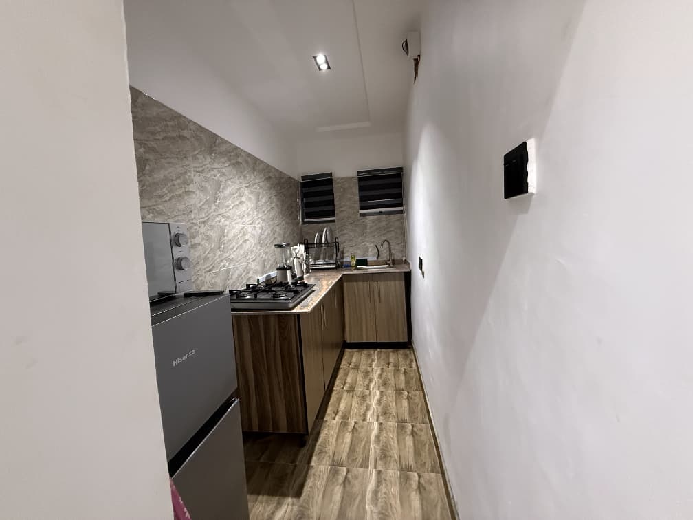 Modern kitchenette at Cedar The Crest, one-bedroom shortlet apartment in Yaba, Lagos
