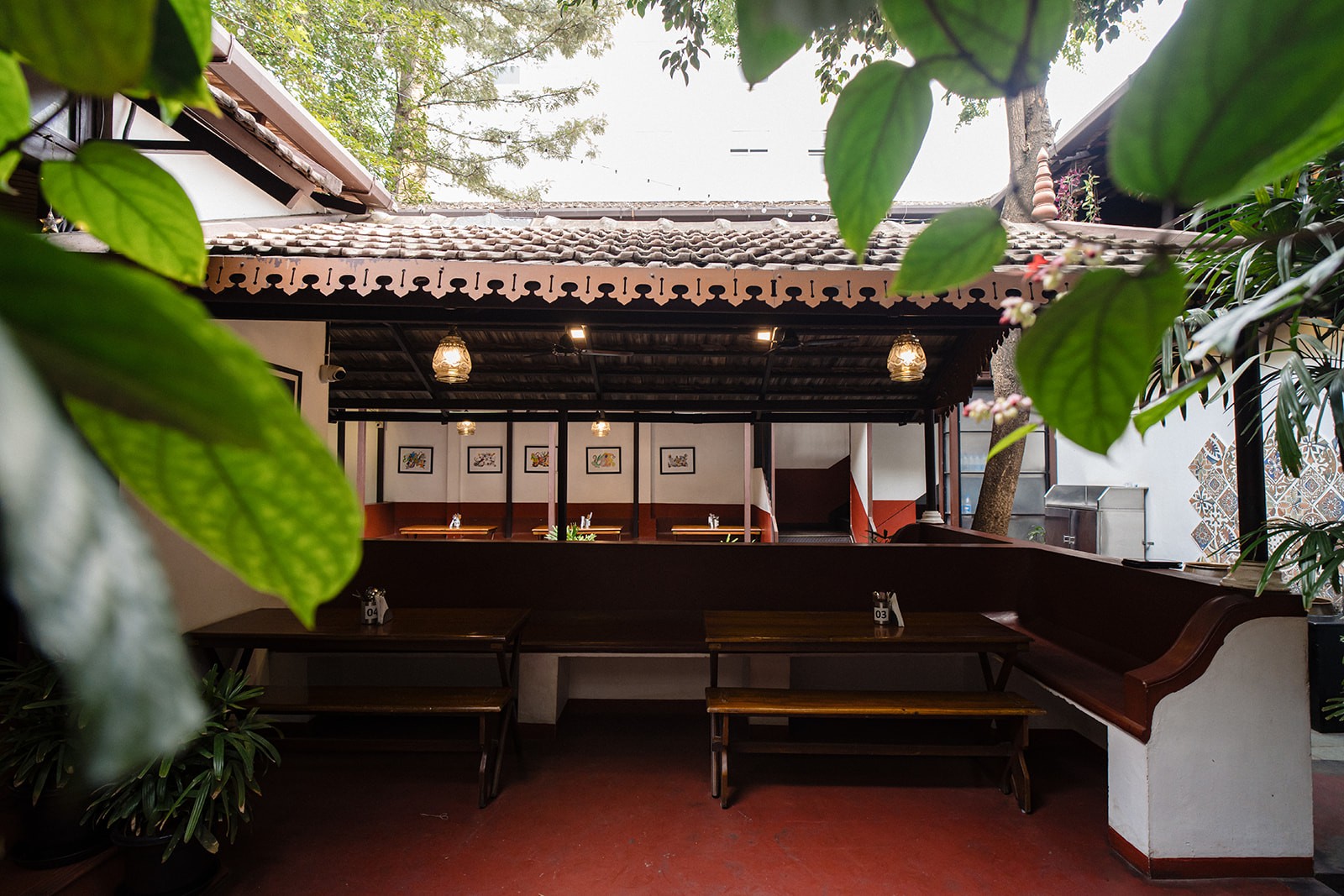 Cozy cafe seating and warm ambiance at DYU Art Cafe, top cafe in Koramangala