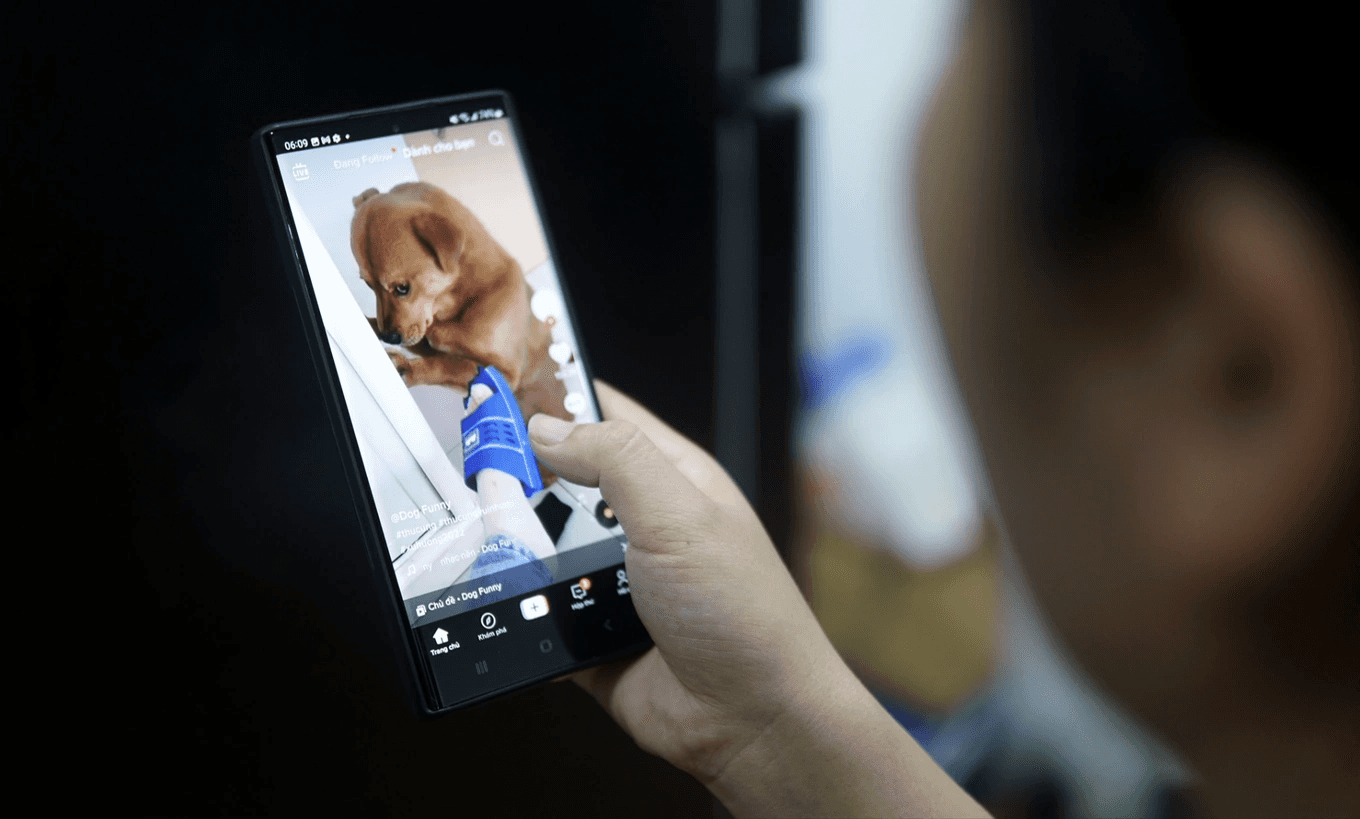 Person watchin video on phone -  How to Make Brainrot Videos