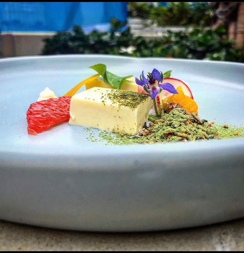 Goat cheese mouse, pink grapefruit, floral Borage, toasted grains