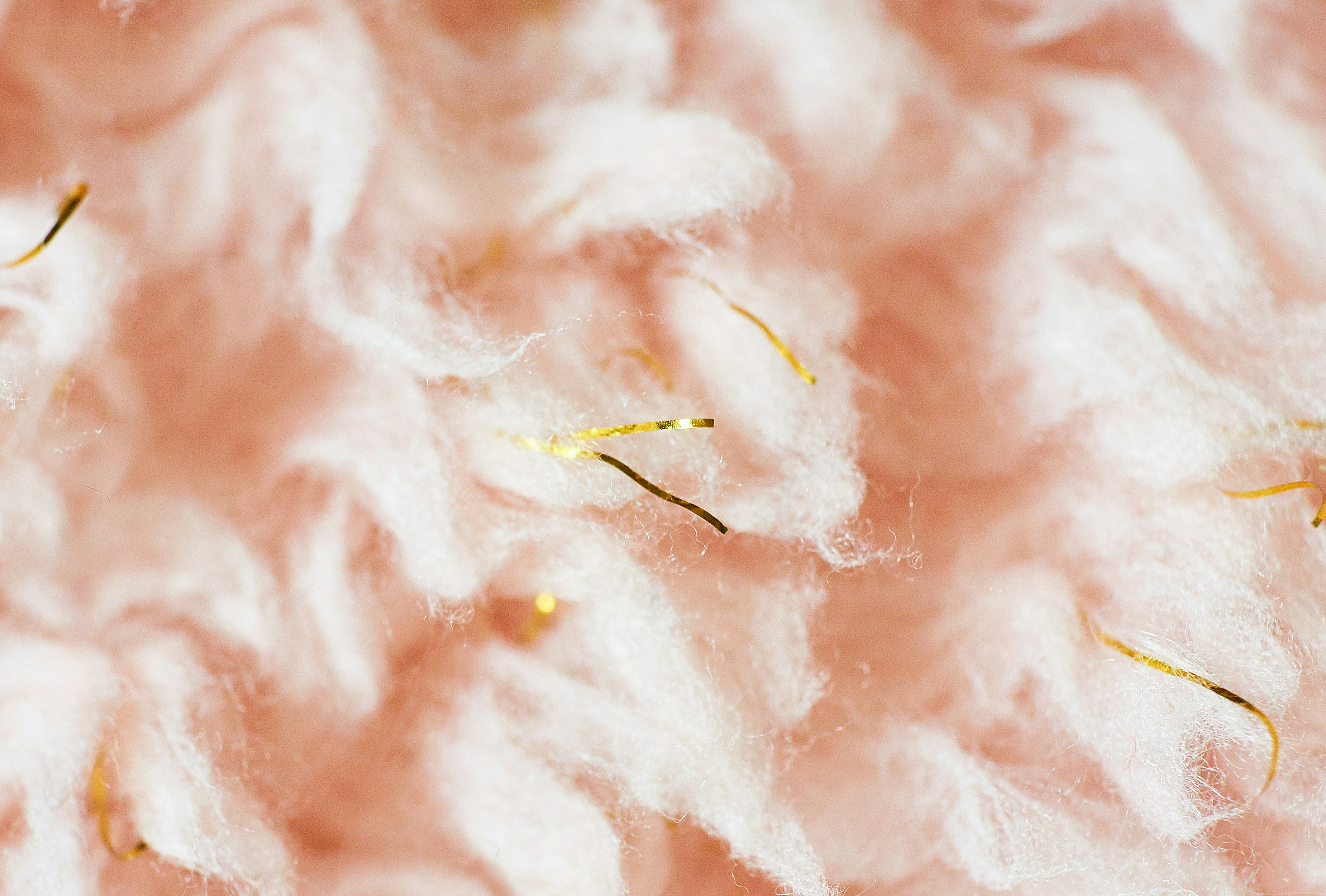 Pink wool fabric with gold tinsel strands