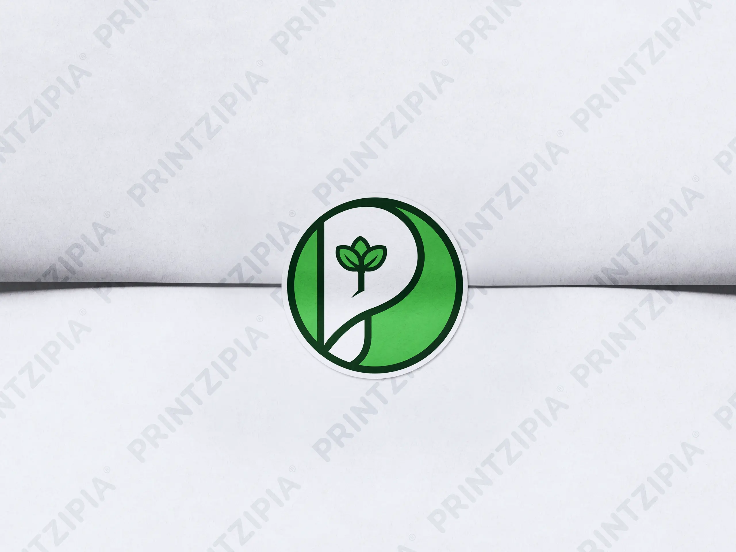 Aufkleber mit Printzipia-Logo auf bedrucktem Papier mit Wasserzeichen