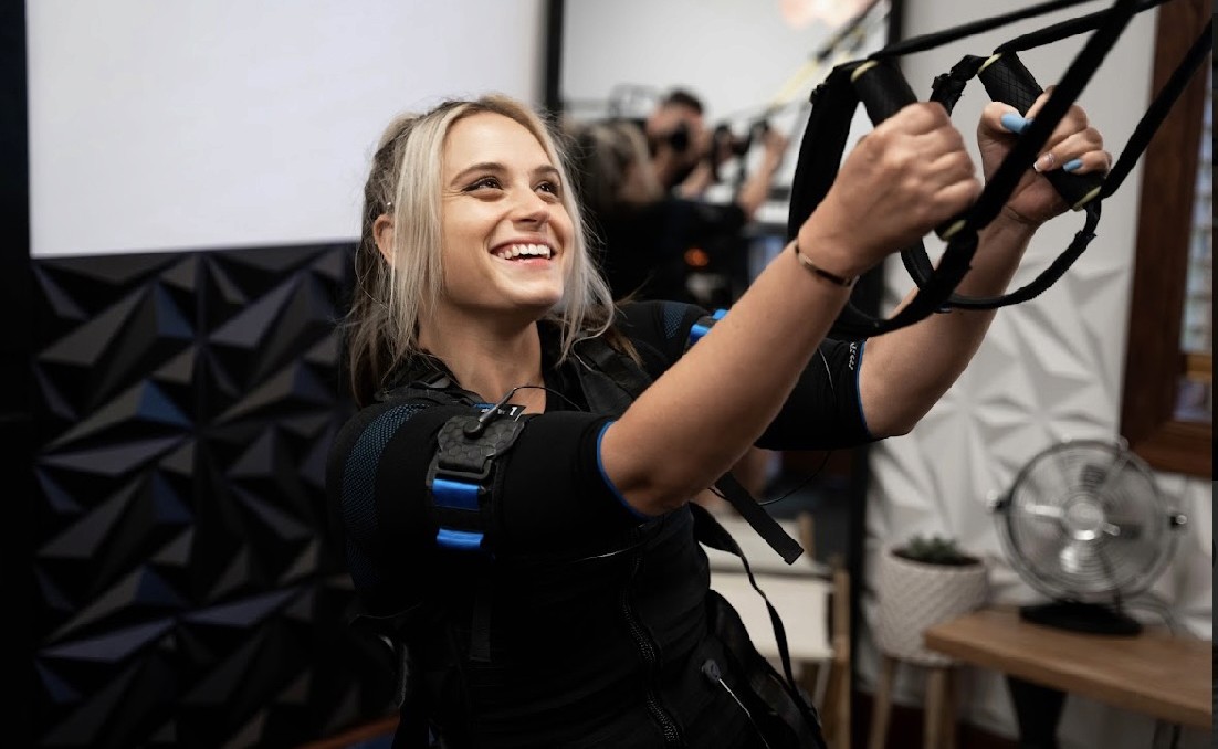 Cliffside with climber at the base