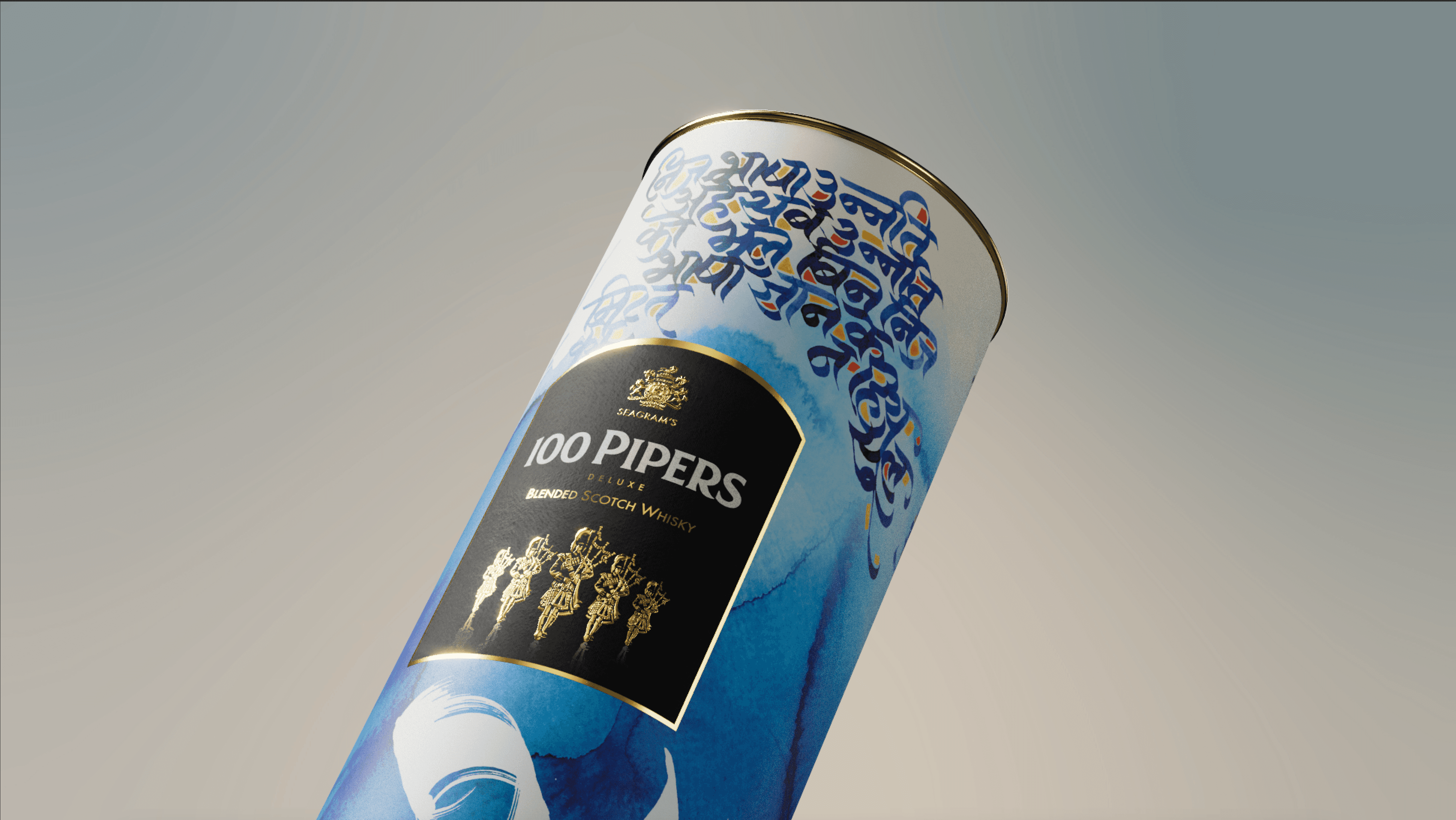 Decorative packaging tube with blue and gold design and label reading 100 Pipers Deluxe Blended Scotch Whisky