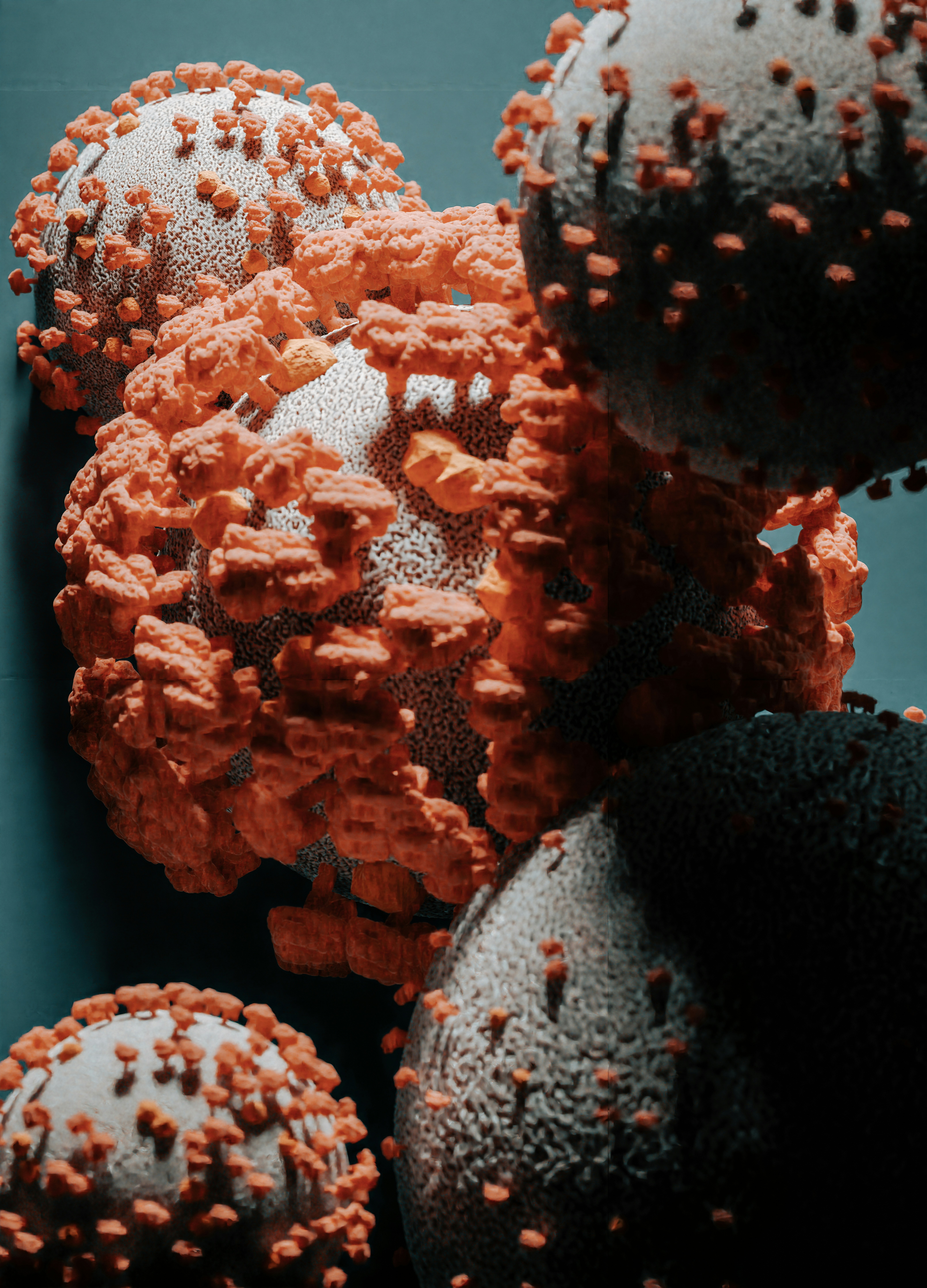 Close-up abstract image of translucent gel or oil bubbles suspended in liquid, creating a scientific and artistic texture.