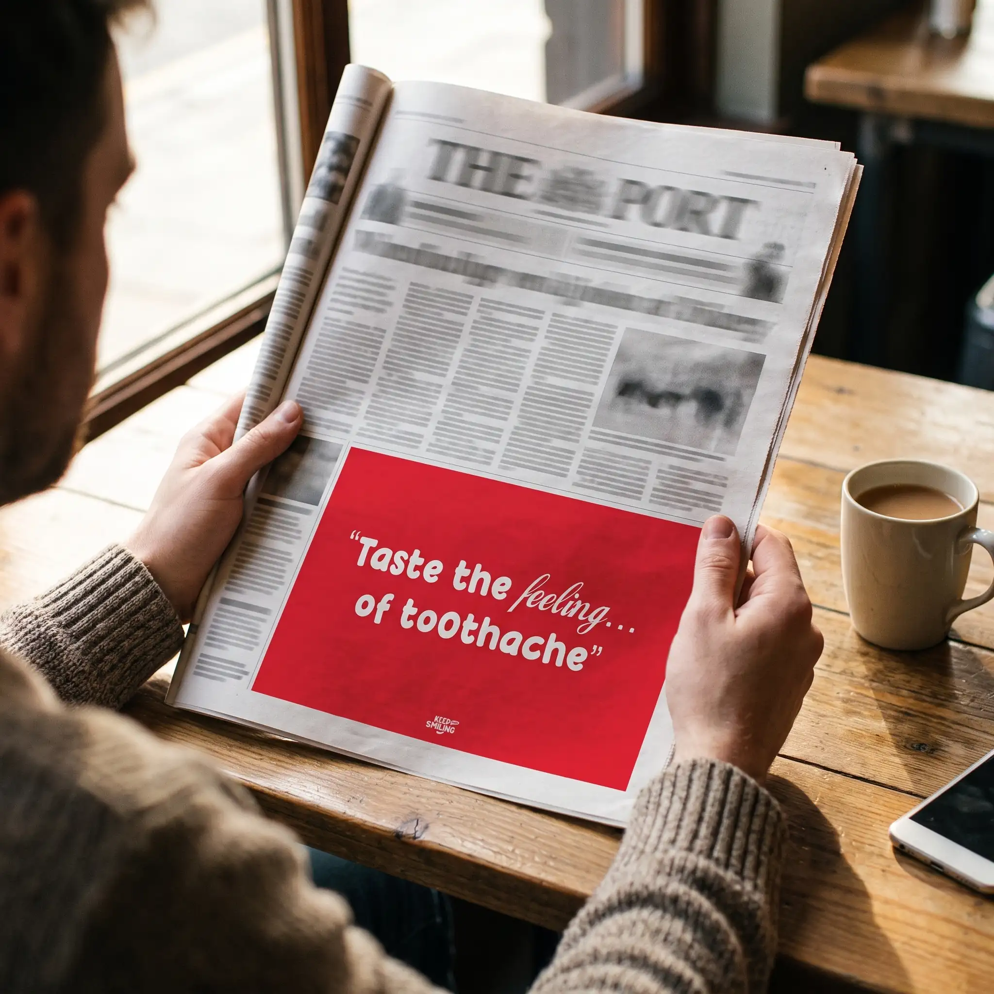 Man reading a newspaper with a full-page "Taste the feeling… of toothache" ad
