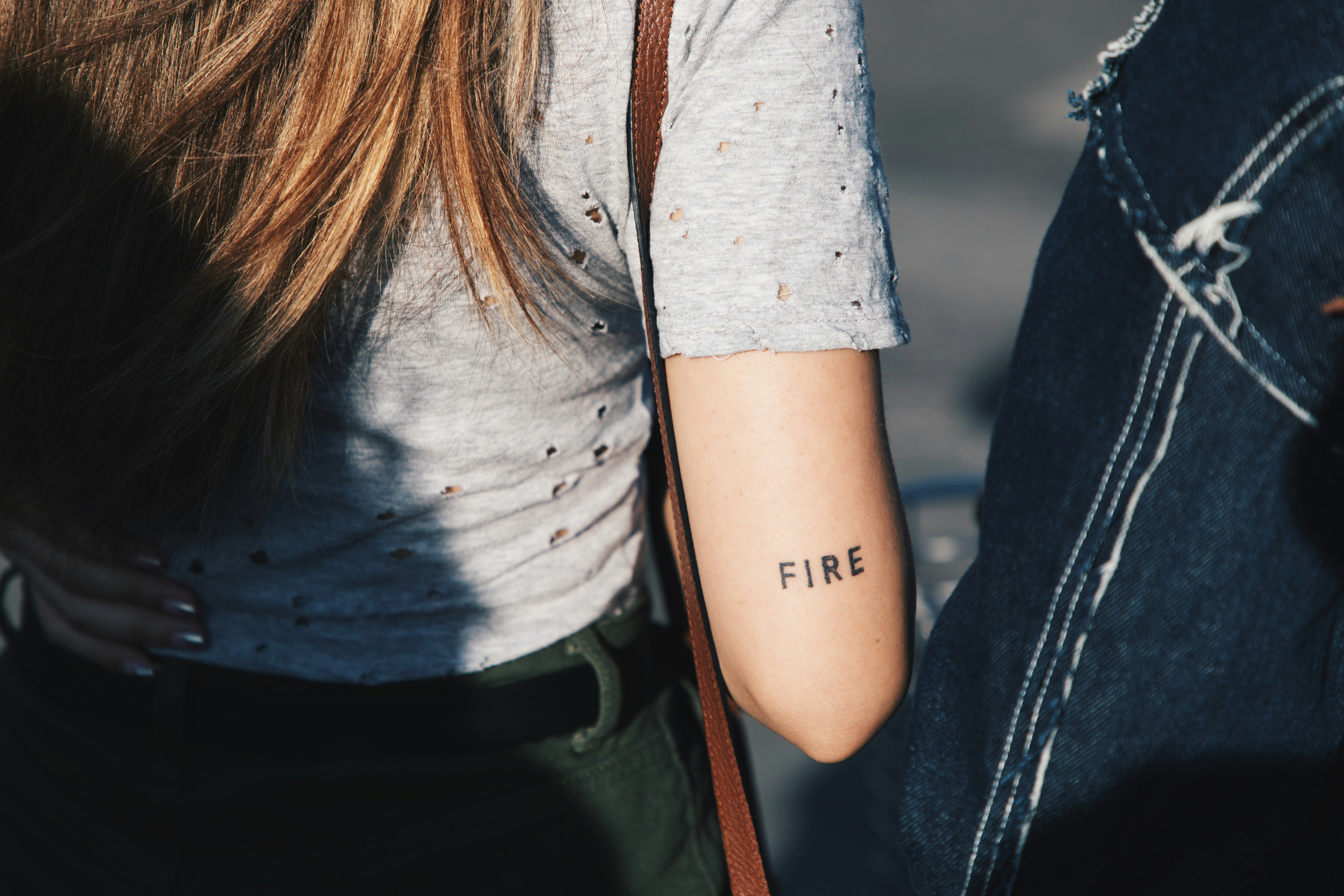 Fine-line tattoo detail