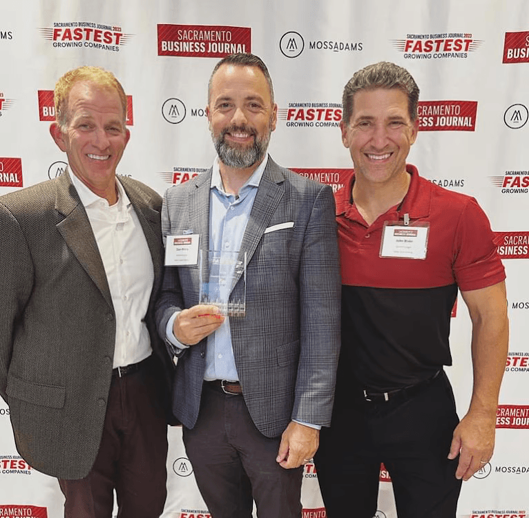 Dan Mora, Tony Daugherty, and John Blake at Sacramento Fastest Growing Company Awards Ceremony for Gemini Legal