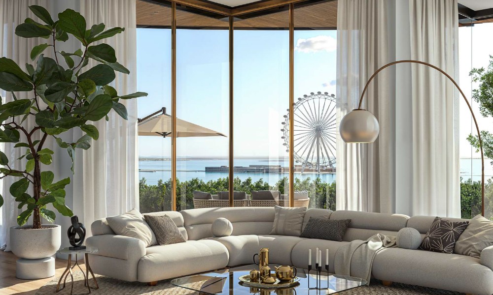 Contemporary living room with a dining area, including a table and chairs, at The Residences at Dubai Beach Edition.