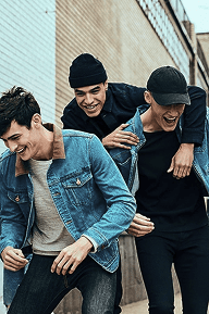 close-up image of a guys shirt wearing a lanyard