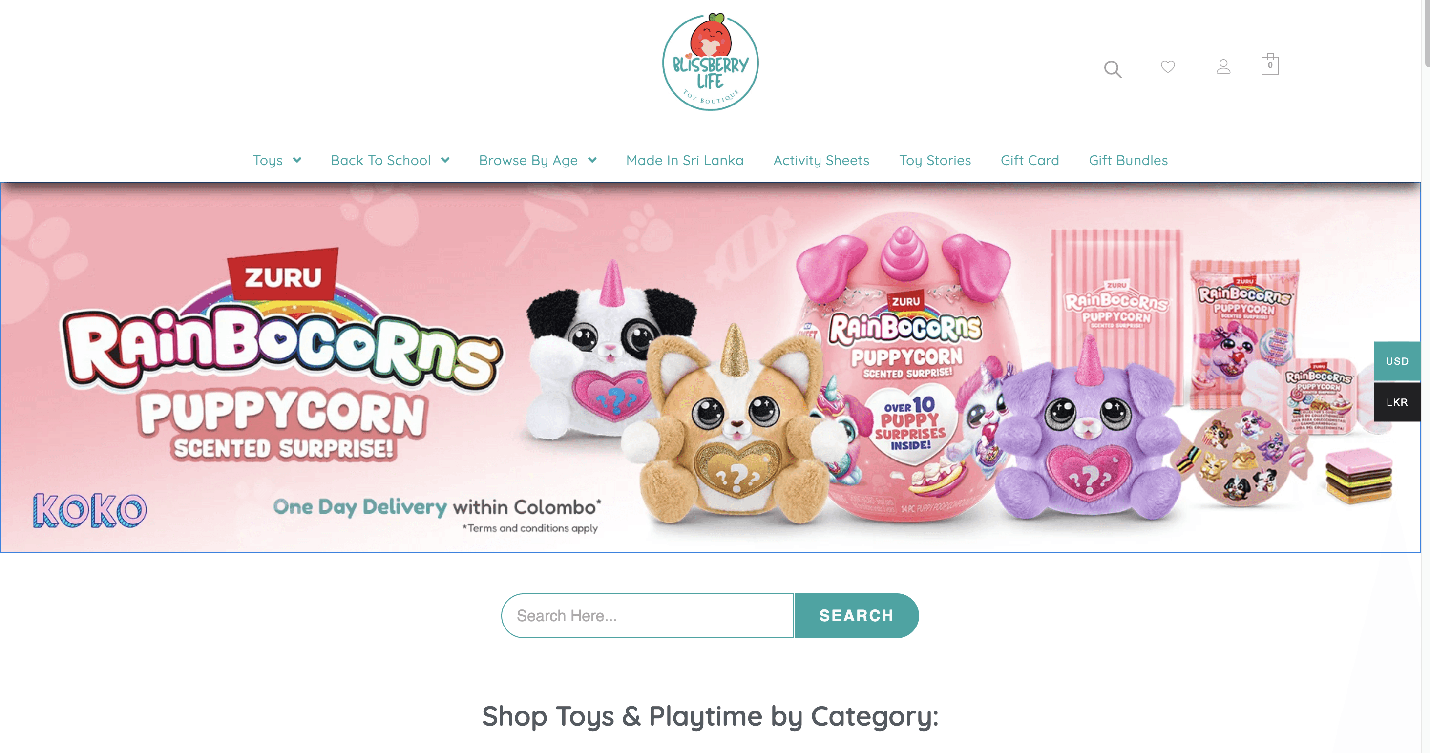 A green butterfly rests on a flower.