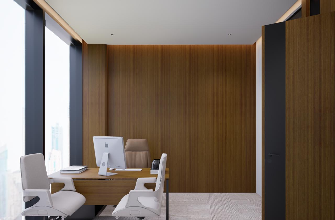 Executive private office in serviced offices in Dubai with floor-to-ceiling windows, wood wall panels, and modern furniture.