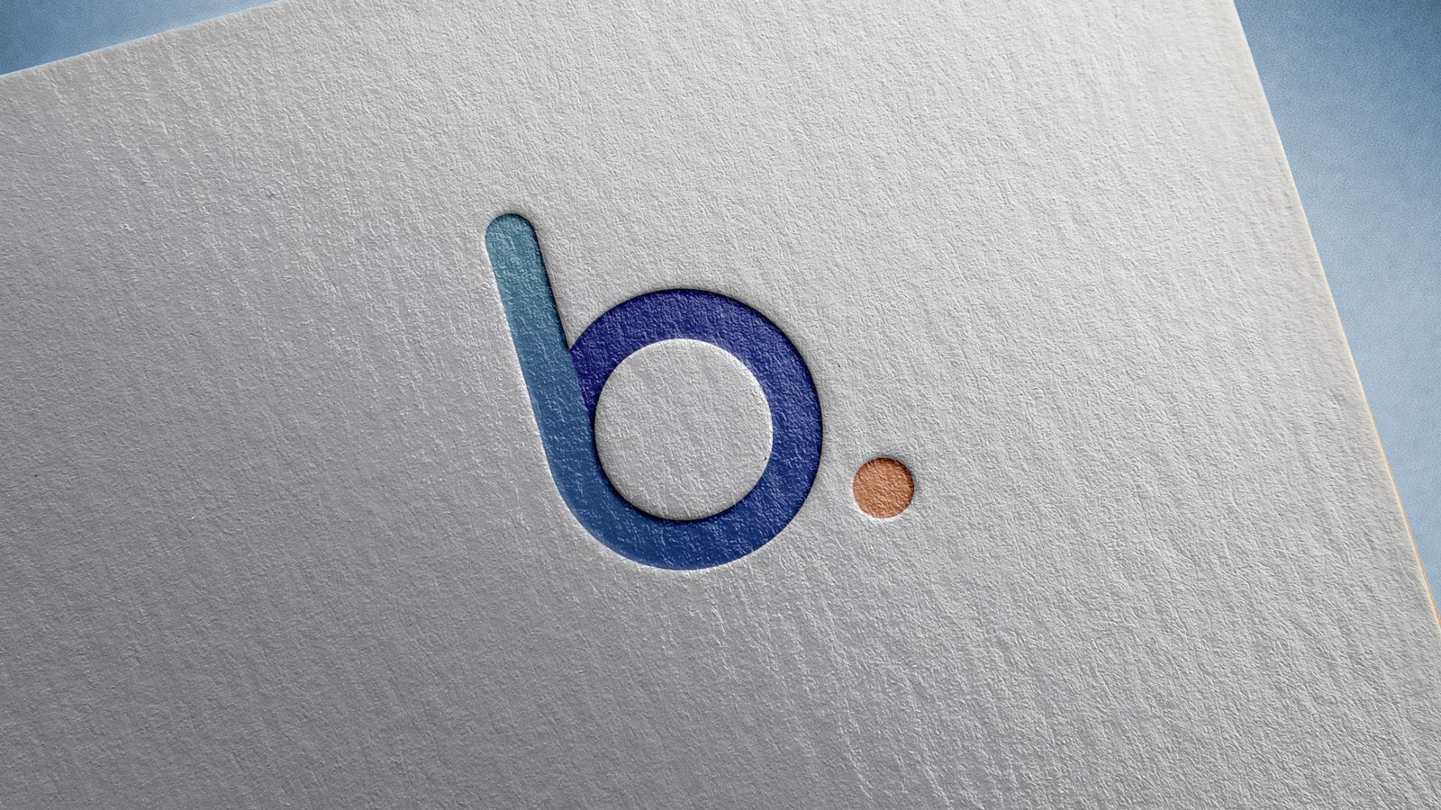 Open book on a soft bed with two oranges placed beside it