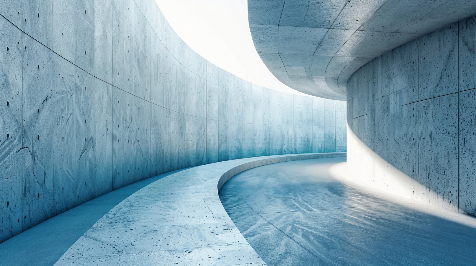 Curved, minimalist concrete walls form an abstract corridor. Smooth floors and soft lighting create a serene, futuristic atmosphere.