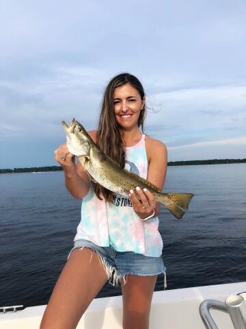 Woman holding Speckled Trout