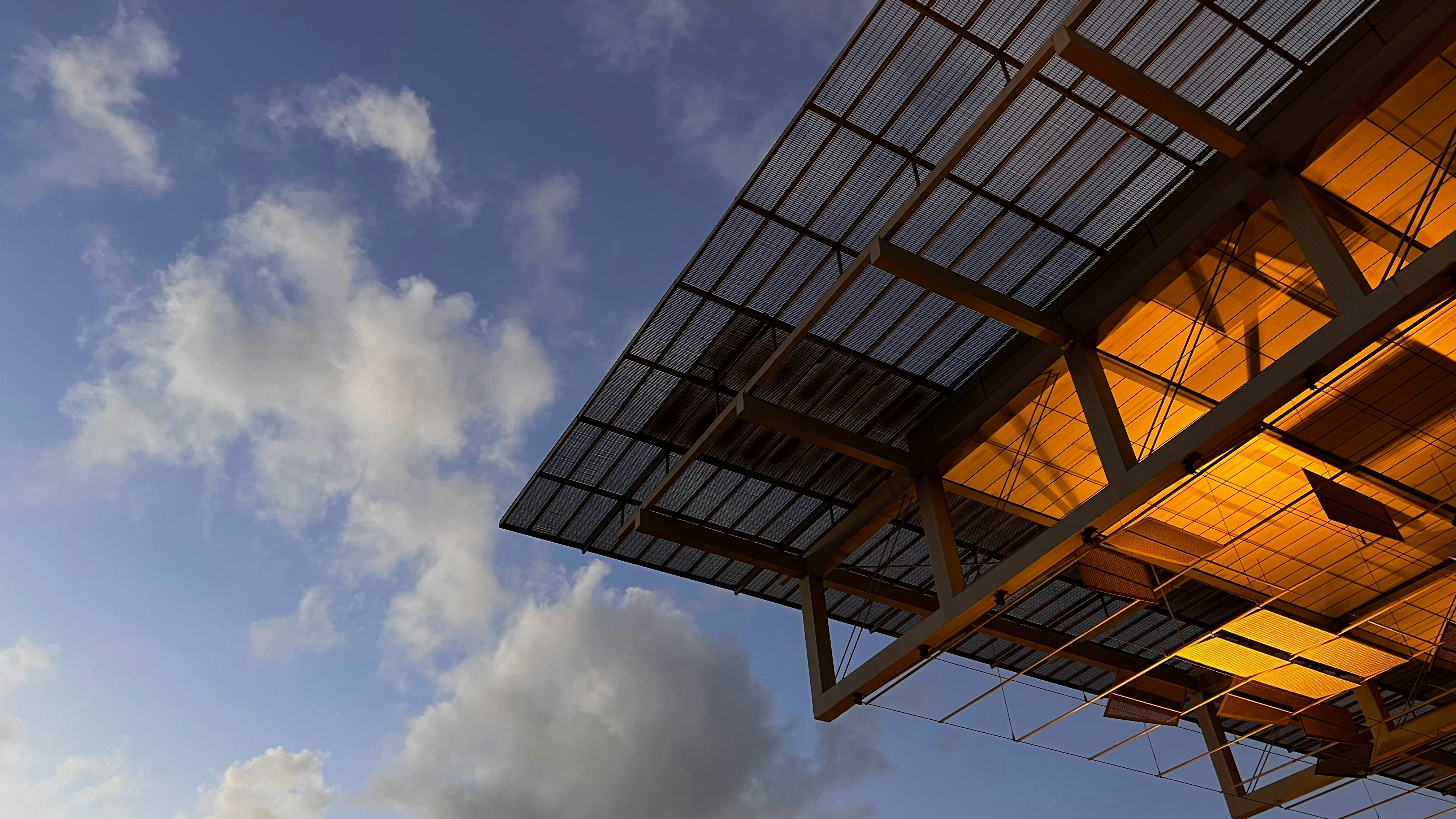 a building with a sky in the background