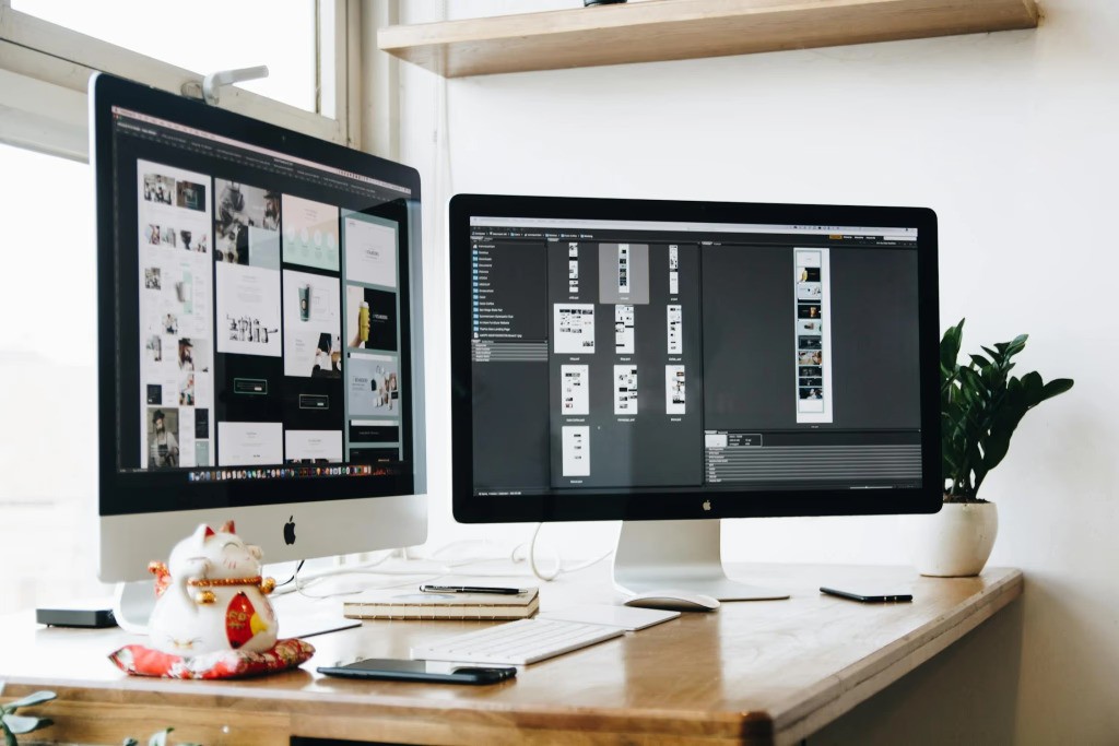 Website landing pages designs displayed on a computer screen