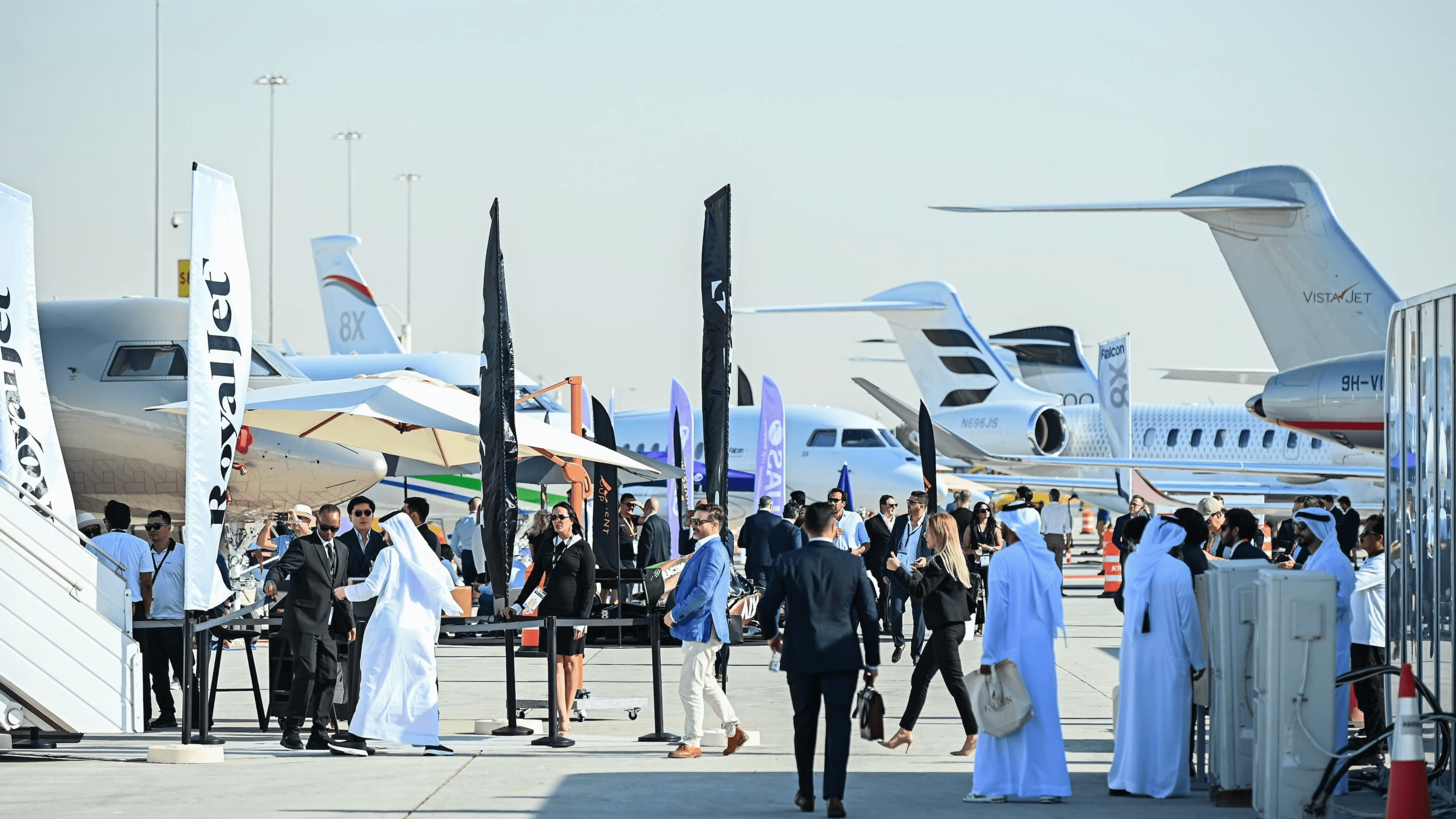 Business aviation aircraft and private aviation professionals at a Dubai aviation event.