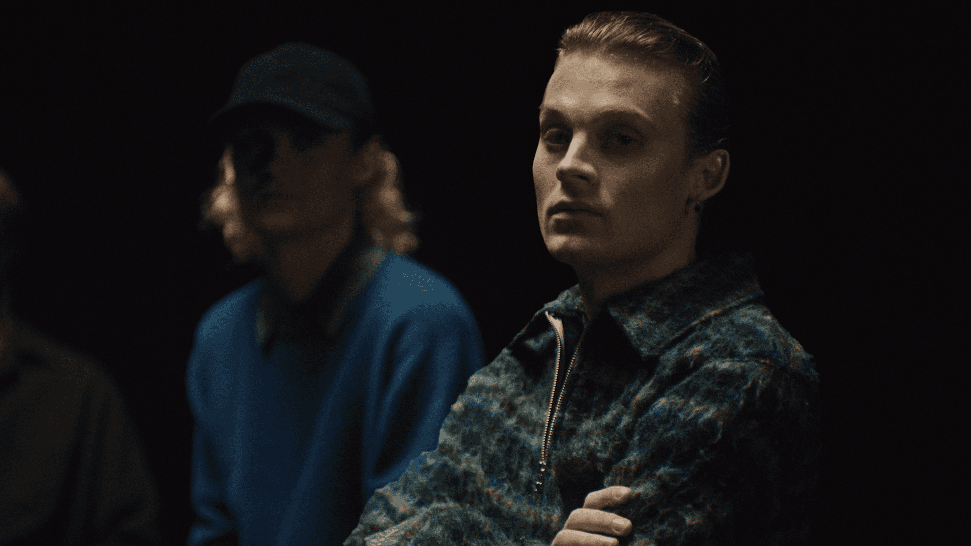 Streetside billboard with flyposters of the Batch.Works brand and illustrations