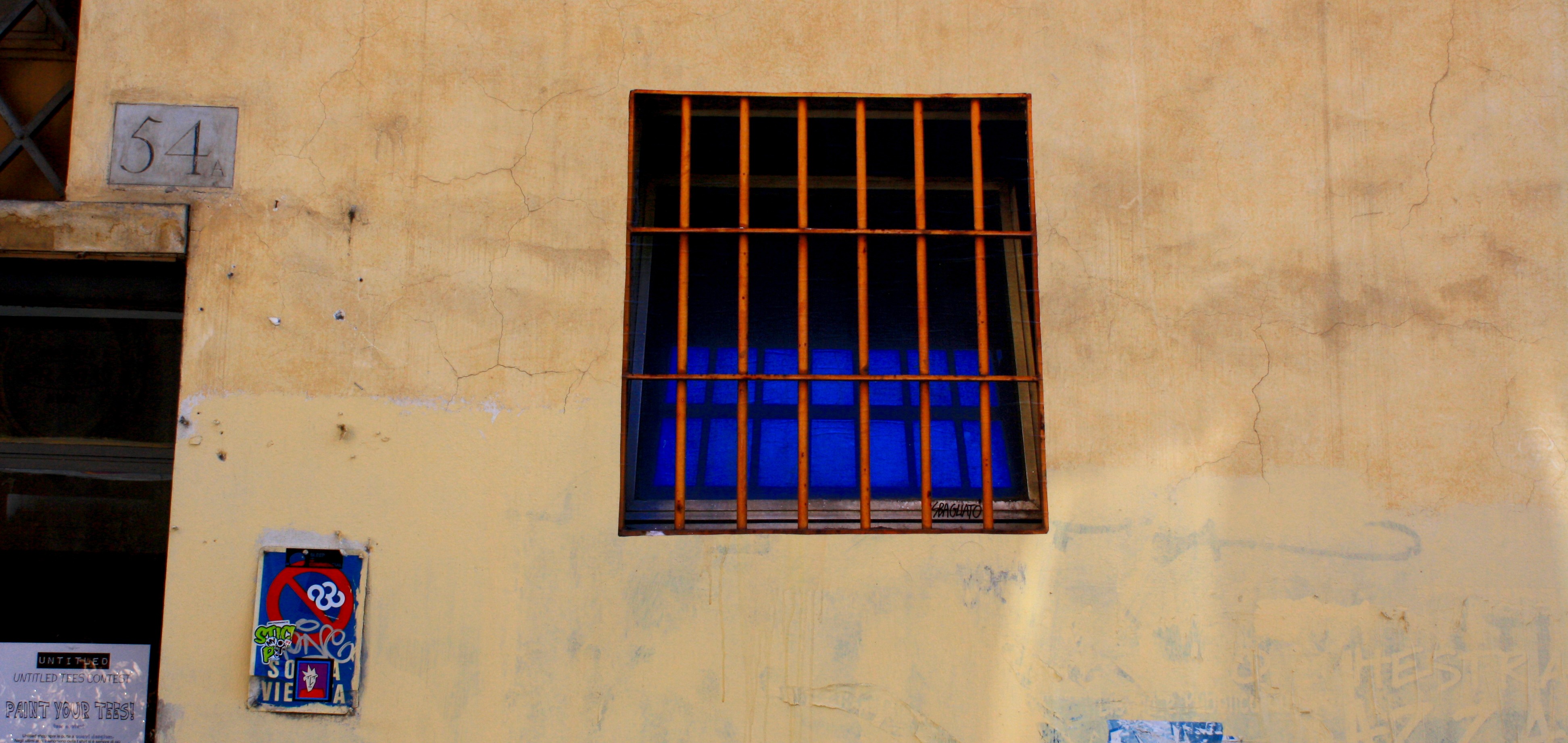 Collage on wall, Rome 2011