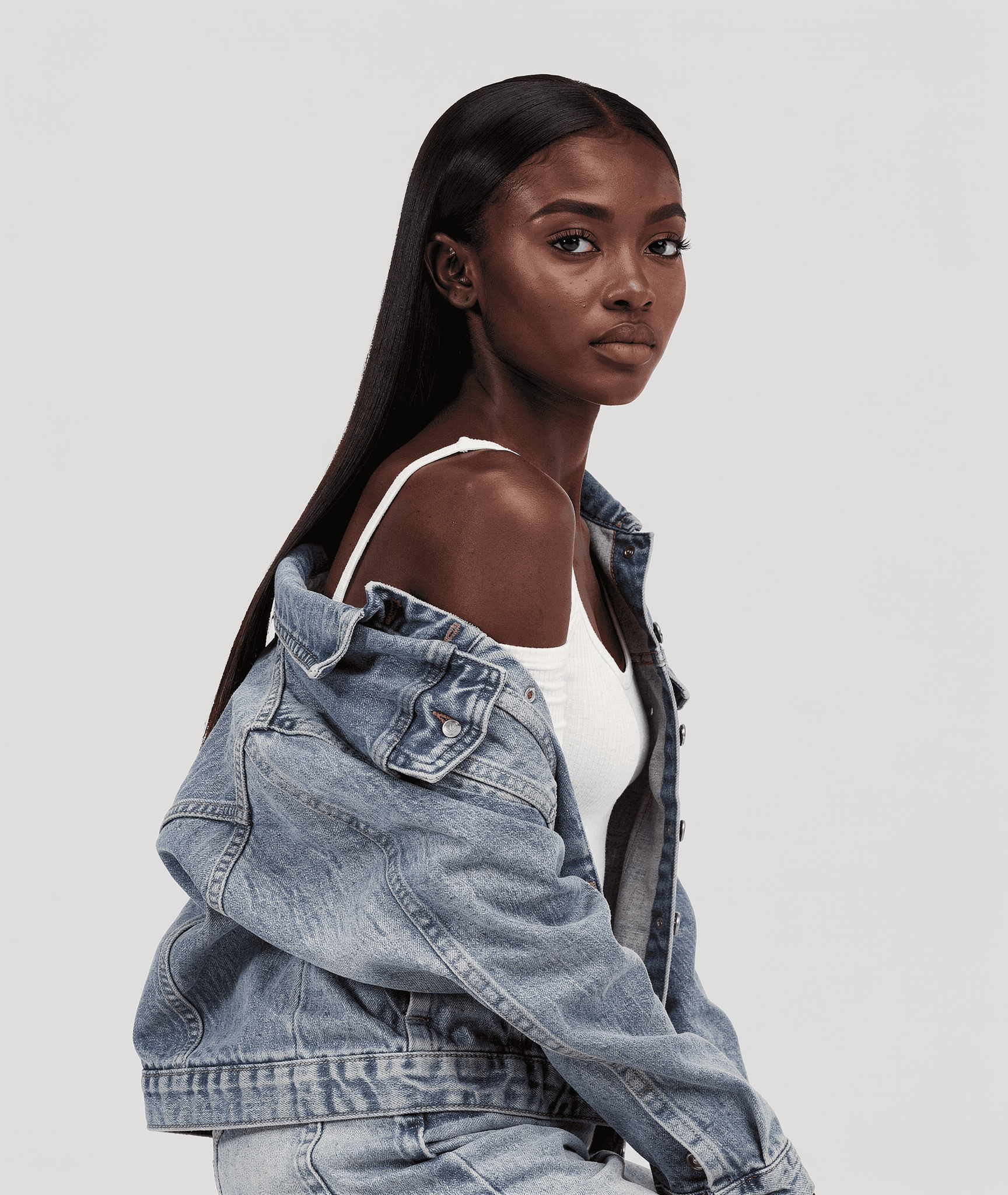woman holding dried flower