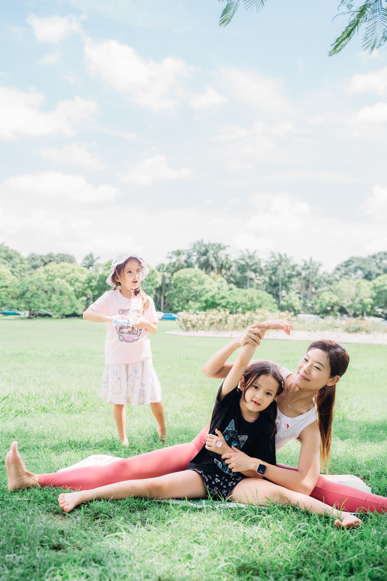 Female yoga instructor teaching a client