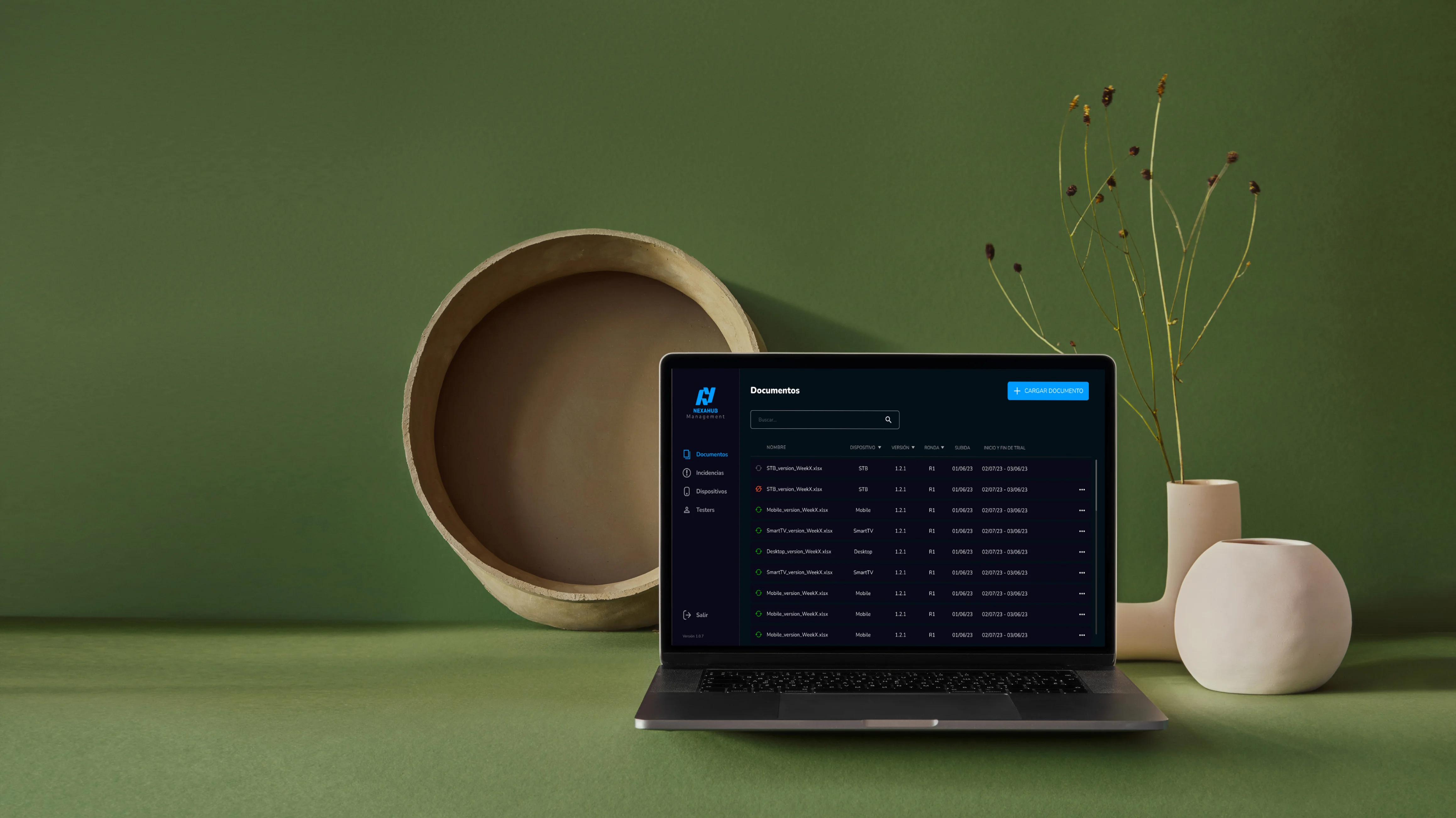 A laptop displaying a CMS app on a table.