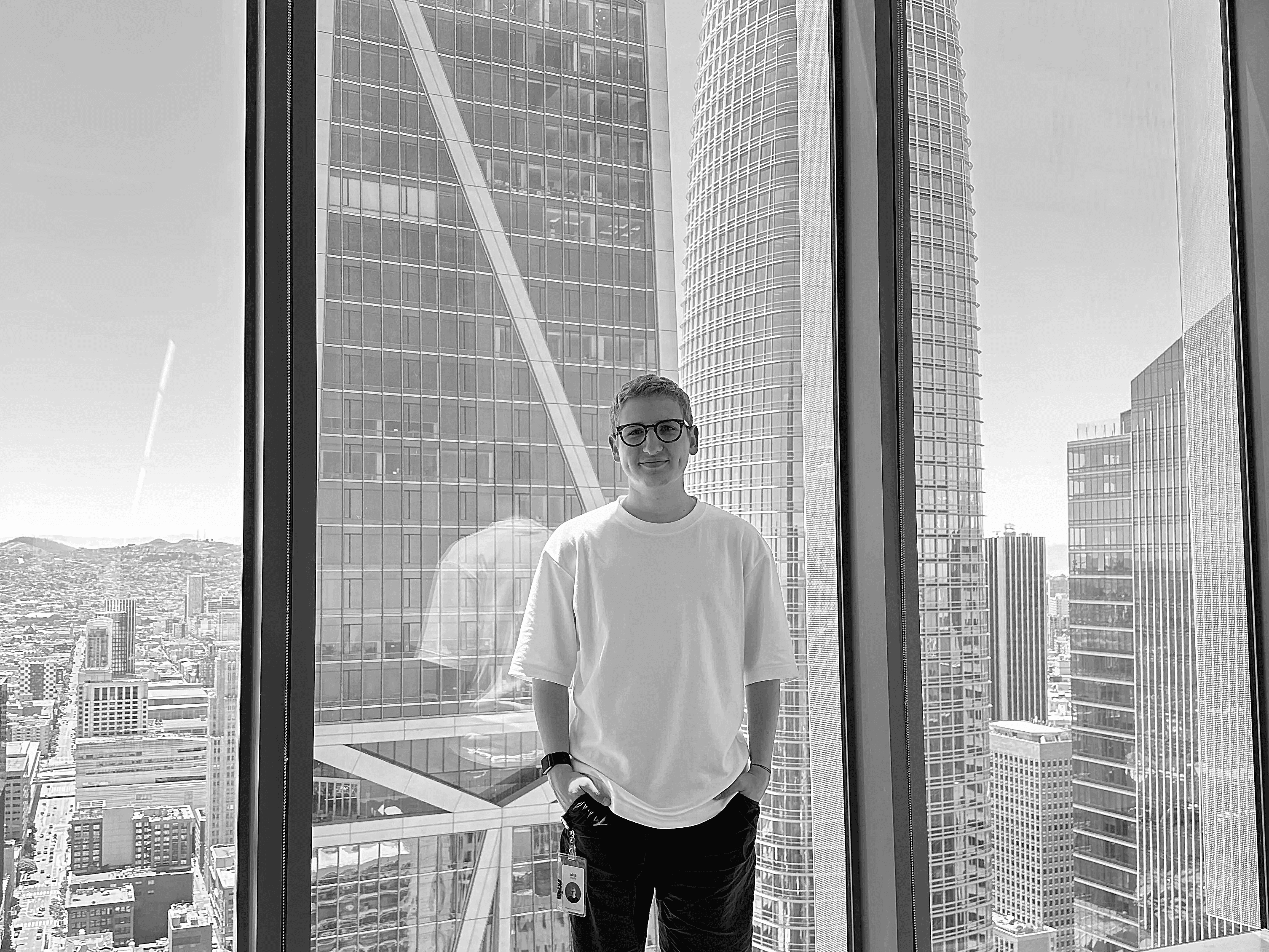 Jakub Zegzulka standing in a tall building.